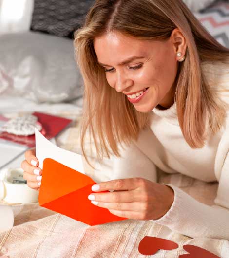 woman opening a card